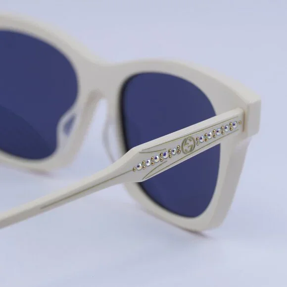 Gucci GG1299S 004 Sunglasses Ivory with Stones Cat Eye Frame, Blue Lenses